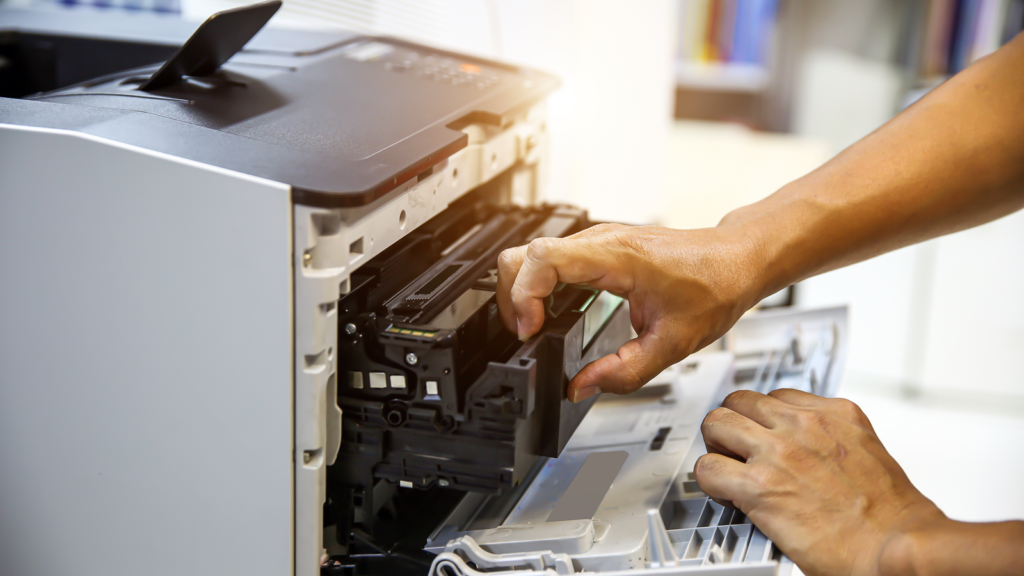 Taking the old toner out of a printer